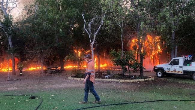 The fire in Noonamah came close to the Hopkins' home on Monday night. Picture: Lenny Klein