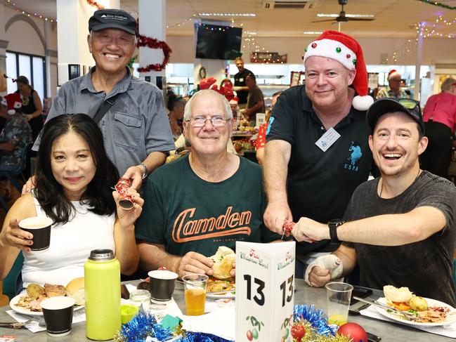 The Cairns Community Christmas Lunch was served up on Christmas day at St Augustine's College, totally free of charge, thanks to the generosity of Cairns businesses, personal donations and a small army of volunteers. Lily Romos, Dr The Pamir, Leon Ford, Cairns Community Christmas Lunch president David Lennie and Jeremy Thomas get into the festive spirit. Picture: Brendan Radke