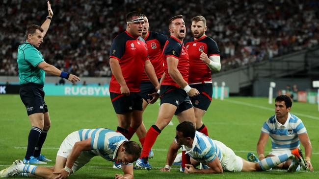 George Ford of England celebrates scoring his side’s fourth try at Tokyo Stadium.