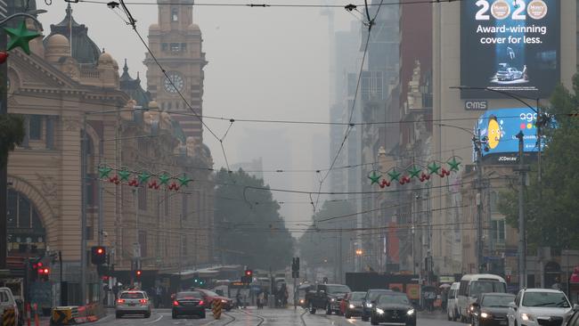 Headlights were a must on the roads on Monday. Picture: David Crosling