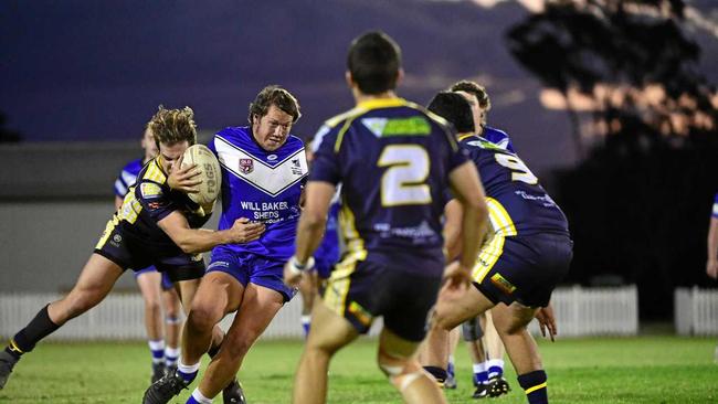 READY FOR FINALS: Wallaroos' Beaudyn McMahon tries to force his way through the Waves in Saturday's loss. Picture: Brian Cassidy