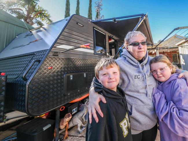 NEWS ADVRental crisis - single mum Jess Blunt living in a caravan with her two kids Lacey, 10 and Simon, 8 in their friend's backyard.Image/Russell Millard Photography