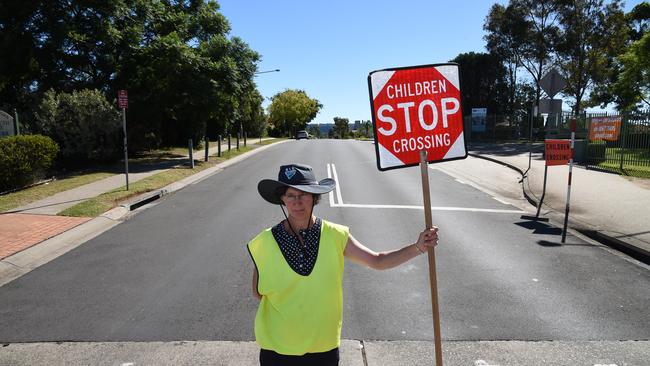 The government has promised more school crossing supervisers. This is crossing supervisor Wendy at Glenmore Park Public School.