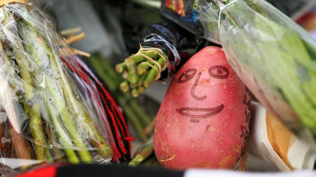 A potato left in tribute for Danny “Spud” Frawley. Picture: Mark Stewart