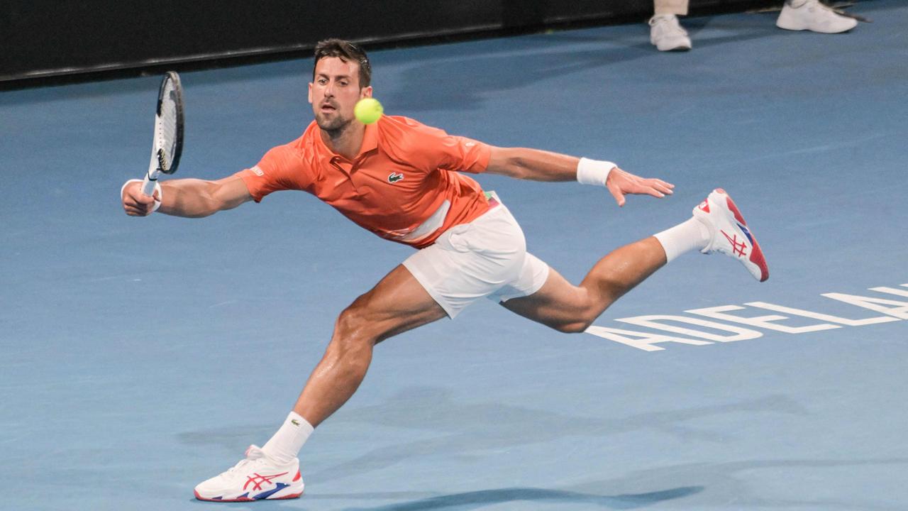 Novak Djokovic hits a return. (Photo by Brenton EDWARDS / AFP)