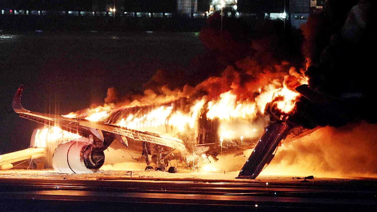 A Japan Airlines plane has burst into flames at Tokyo's Haneda Airport. Picture: JIJI PRESS / AFP / Japan OUT