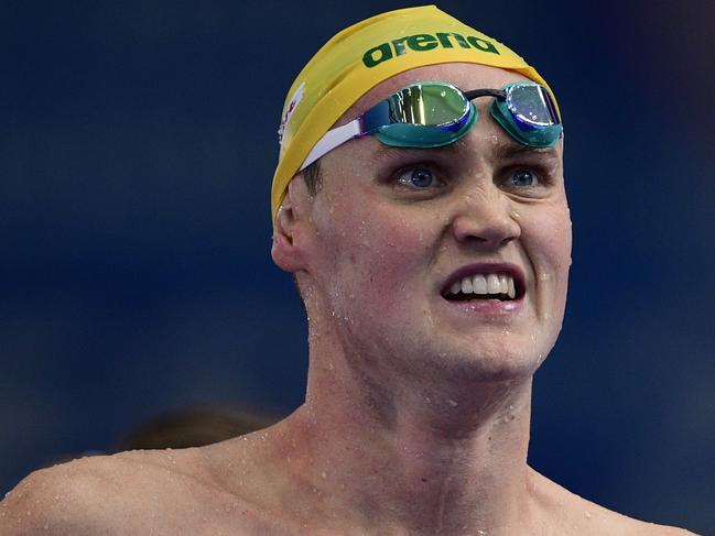 (FILES) This file photo taken on July 23, 2017 shows Australia's Mack Horton reacting after competing in a men's 400m freestyle heat during the swimming competition at the 2017 FINA World Championships in Budapest. Horton will be among the world-class competitors in action when the Commonwealth Games begin on April 4, 2018 in Australia's Gold Coast. / AFP PHOTO / Martin BUREAU