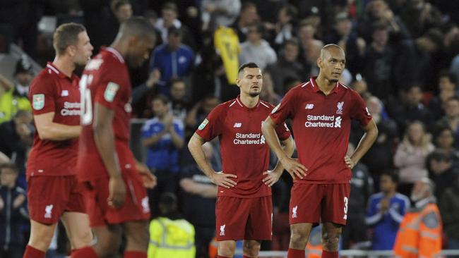 Dejected Liverpool players after losing their first game of the season. Picture: AP