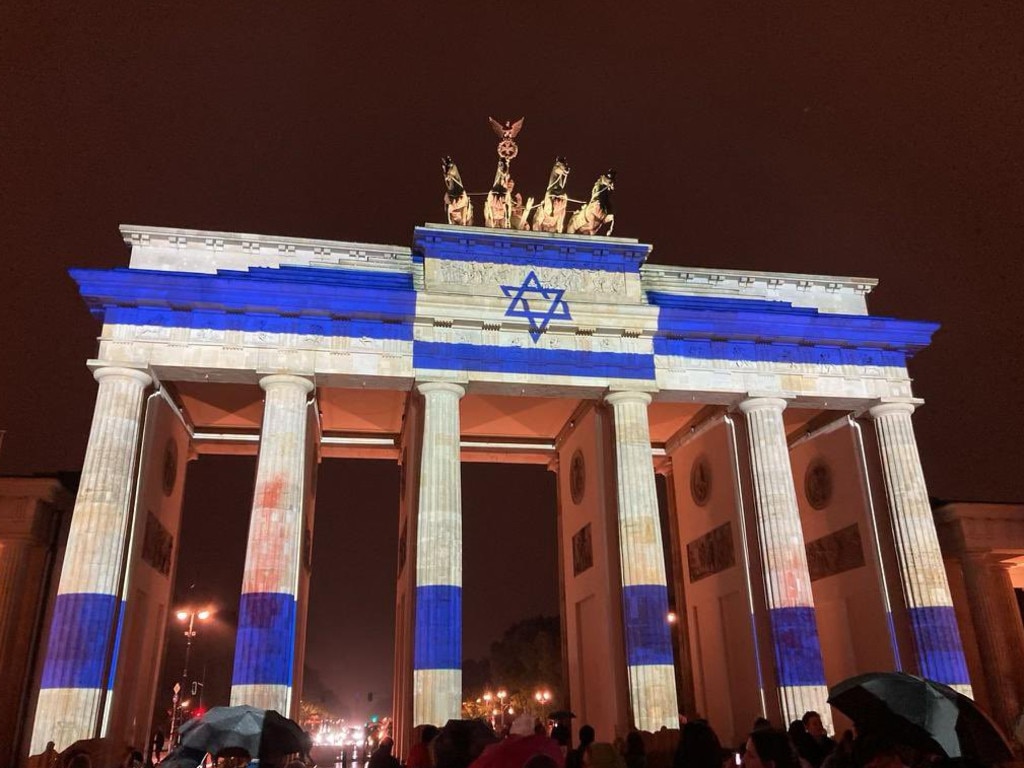 Berlin’s Brandenburg Gate is lit up in the blue and white of the flag of Israel. Picture: X