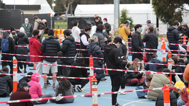 Large queues at a St Kilda walk-in centre on Thursday. Picture: David Crosling