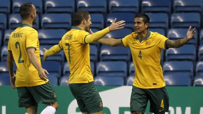 Tim Cahill (R) will guide his young teammates through the World Cup experience.