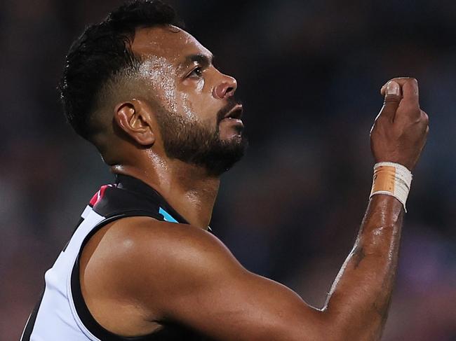 ADELAIDE, AUSTRALIA - JULY 08: Junior Rioli of the Power celebrates a goal during the 2023 AFL Round 17 match between the Port Adelaide Power and the Gold Coast Suns at Adelaide Oval on July 8, 2023 in Adelaide, Australia. (Photo by James Elsby/AFL Photos via Getty Images)