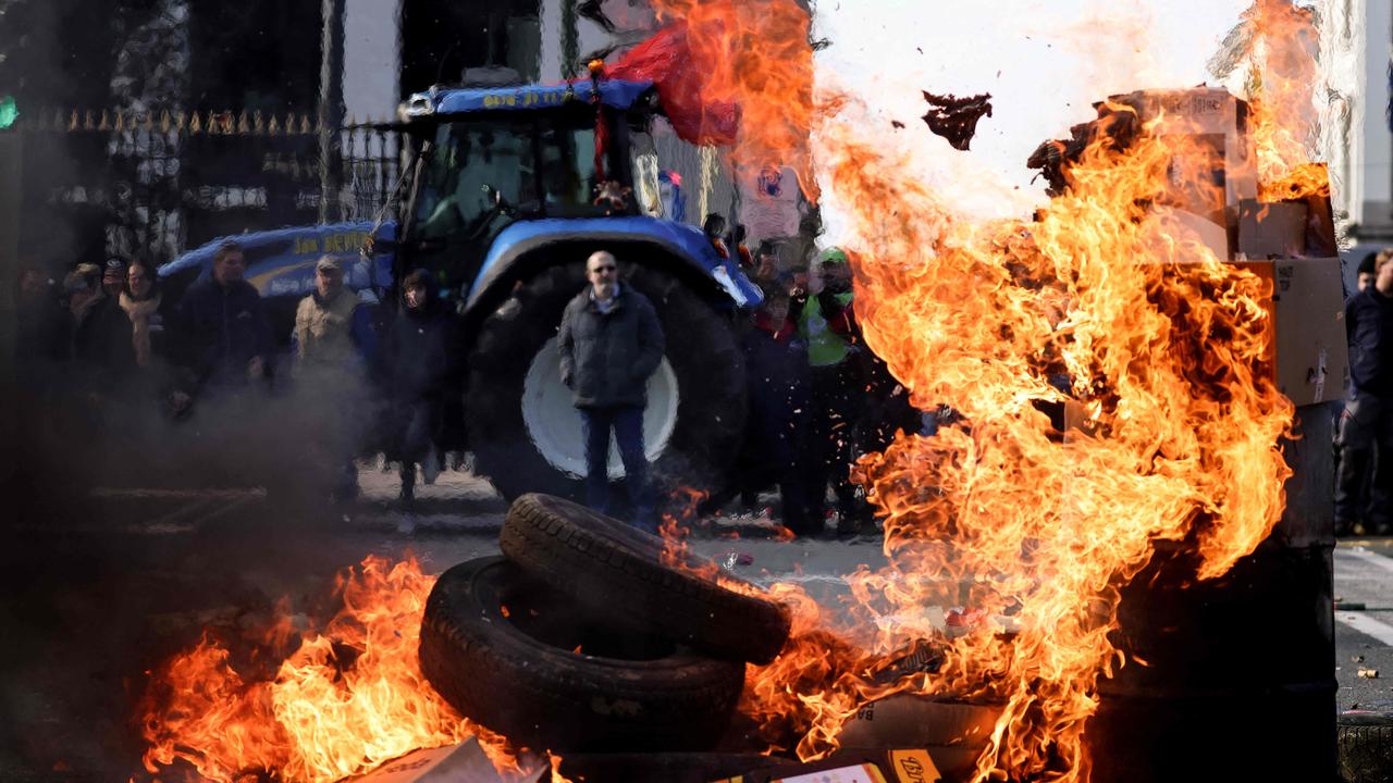 Slow-moving convoys of some 2700 tractors blocked roads in Brussels as Flemish farmers protested over a green push by the government of their region. Picture: Kenzo Tribouillard/AFP