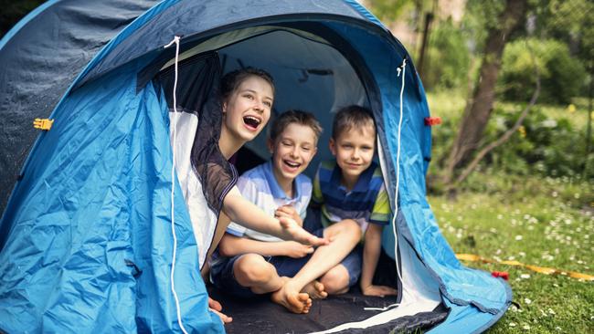 Camping with the family offers time in nature where kids can explore at their own pace and develop a sense of independence. Picture: iStock