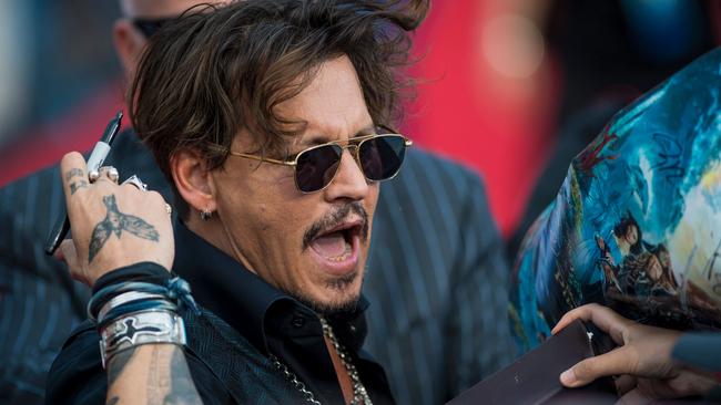 Actor Johnny Depp arrives for the world premiere of Disney movie "Pirates of the Caribbean: Dead Men Tell No Tales" in Shanghai on May 11, 2017. / AFP PHOTO / Johannes EISELE