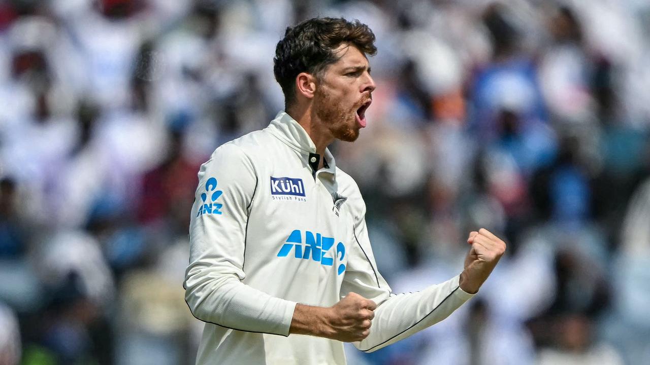 New Zealand's Mitchell Santner celebrates after taking the wicket of India's Yashasvi Jaiswal during the third day of the second Test cricket match between India and New Zealand at the Maharashtra Cricket Association Stadium in Pune on October 26, 2024. (Photo by Punit PARANJPE / AFP) / -- IMAGE RESTRICTED FOR EDITORIAL USE - STRICTLY NO COMMERCIAL USE --