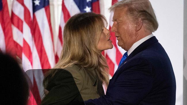 Donald Trump embraces Melania after her address. Picture: AFP.