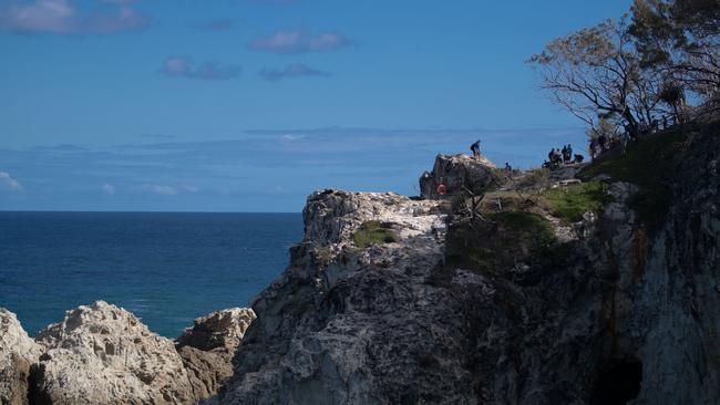 A car has fallen from a cliff into bushland on North Stradbroke Island.