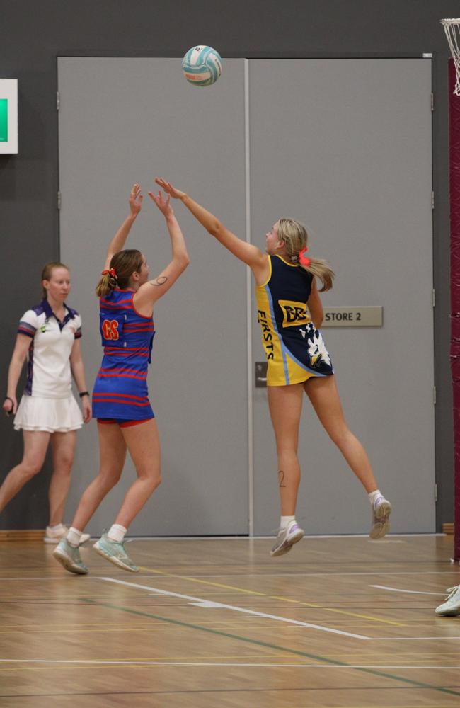 Netball action at QISSN 2024 held in Townsville. St Columbans College v Downlands College