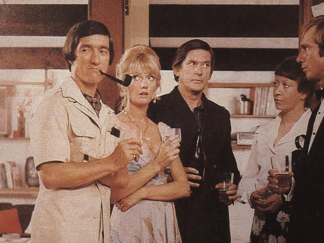 Actors (L-R) Graeme Blundell, Veronica Lang, Ray Barrett, Pat Bishop and John Hargreaves in a scene from the 1976 film 'Don's Party'.