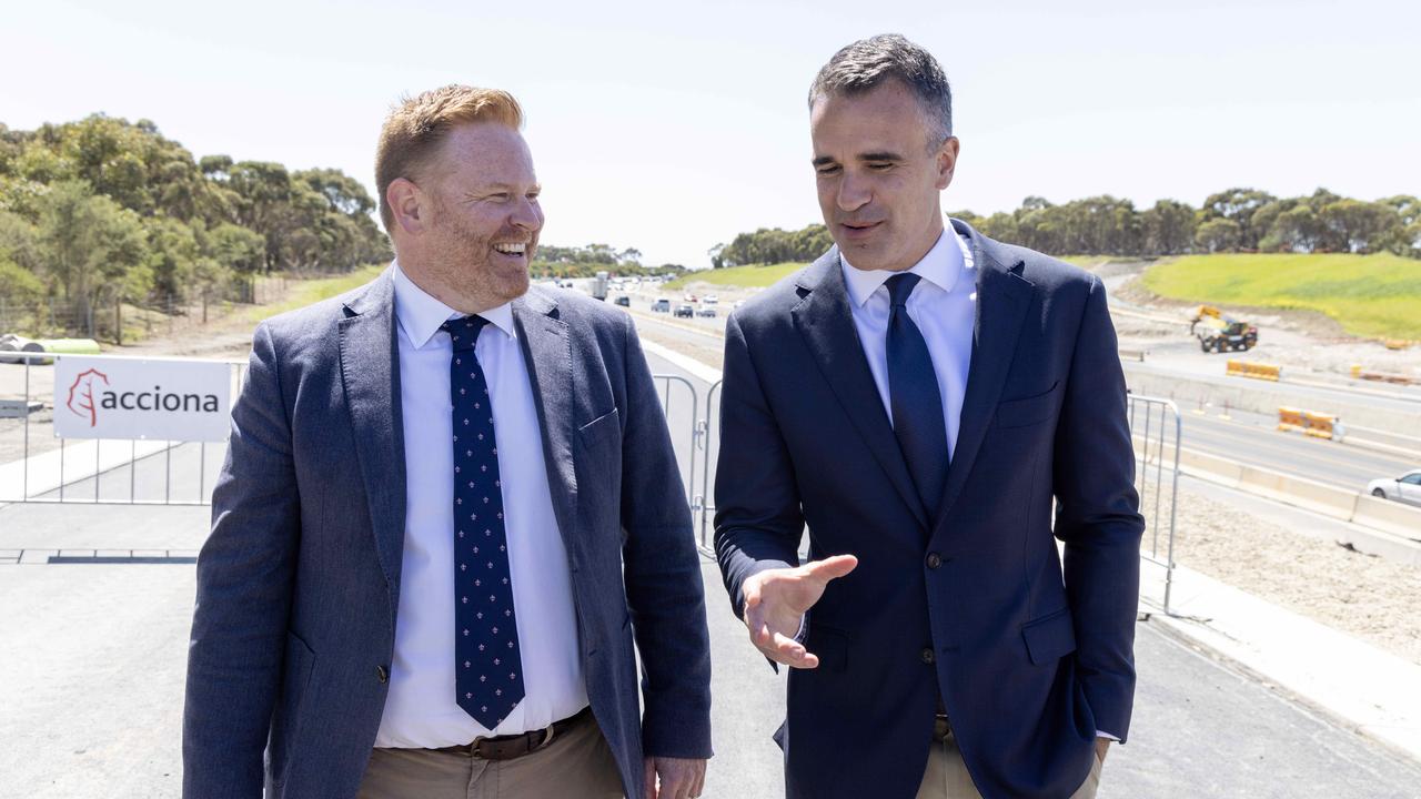 Premier Peter Malinauskas with Labor's candidate for Black, Alex Dighton, at the Majors Road upgrade. Picture: Kelly Barnes