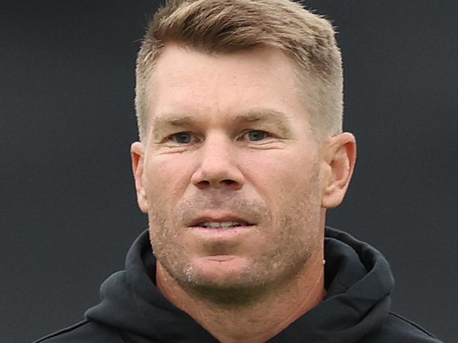 CANBERRA, AUSTRALIA - JANUARY 14:  David Warner of the Thunder warms up during the BBL match between Sydney Thunder and Adelaide Strikers at Manuka Oval, on January 14, 2024, in Canberra, Australia. (Photo by Mark Metcalfe/Getty Images)