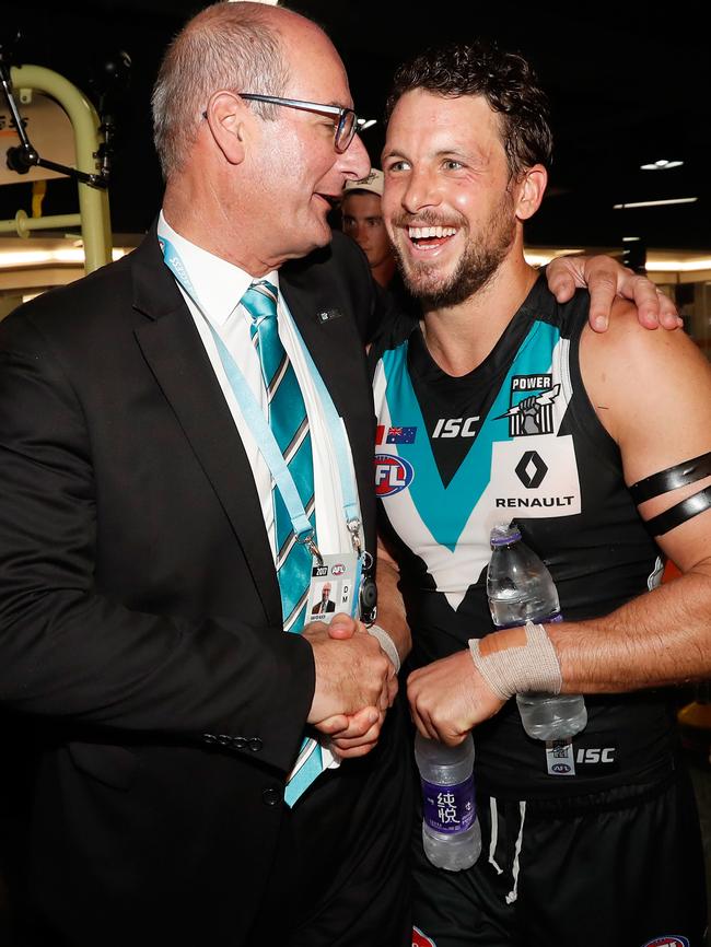 Port chairman David Koch celebrates with Travis Boak after the Power’s historic win over Gold Coast in Shanghai. Picture: Michael Willson / AFL Media / Getty Images