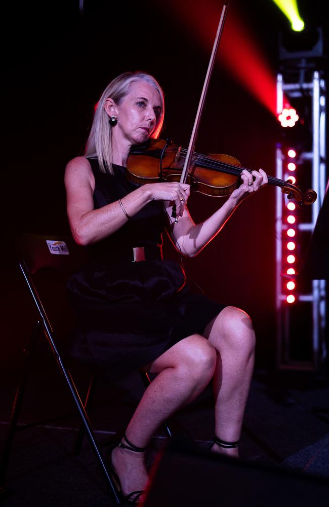 A violinist entertains the crowd at the Great Humpty Ball. Picture: Pema Tamang Pakhrin