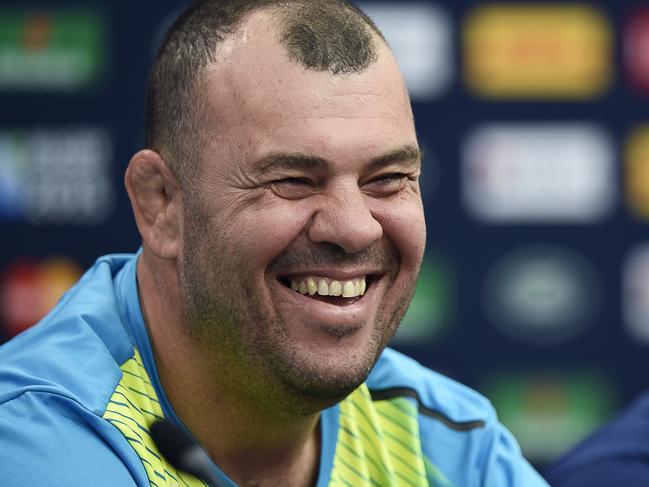 Australia's head coach Michael Cheika (L) and Australia's wing Adam Ashley-Cooper (R) deliver a press conference on October 2, 2015 at Twickenham Stadium in southwest London, on the eve of their 2015 Rugby Union World Cup match against England. AFP PHOTO / MARTIN BUREAU RESTRICTED TO EDITORIAL USE