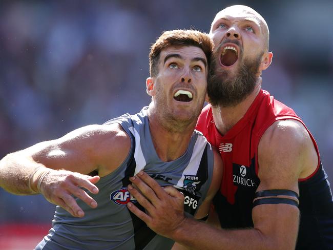 Scott Lycett (left) and teammate Paddy Ryder each had 16 hit-outs while Melbourne’s Max Gawn (right) had 21. Picture: Michael Klein.