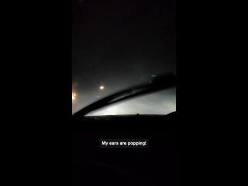 Terrifying moment car drives through tornado