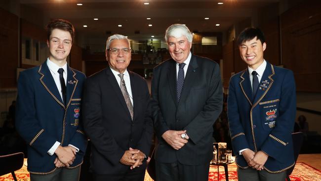 Warren Mundine and Frank Brennan flanked by St Aloysius College’s Oliver Grant, left, and Matthew Ham. Picture: John Feder