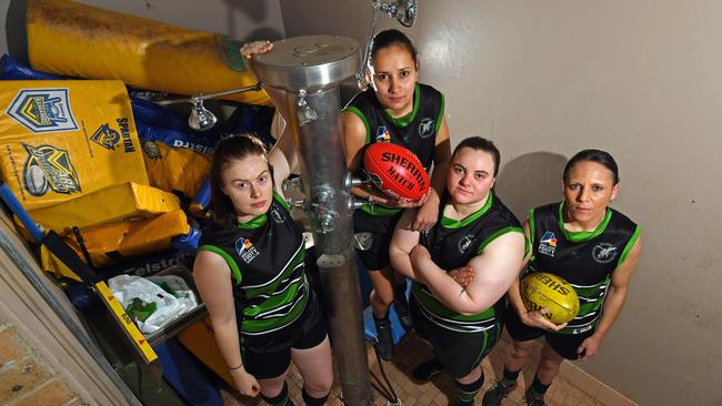 Greenacres Football Club women's players Sally Young, Reanna Sumer, Teena Leicester and Aaitje Bakhuis in the away change rooms which are in a terrible state. Picture: Tom Huntley