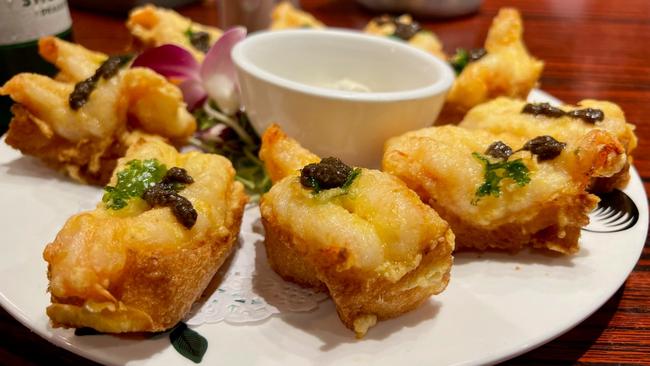 Black truffle shrimp toast plate at Ladies Street Sik Fan Co. Picture: Amanda Woods