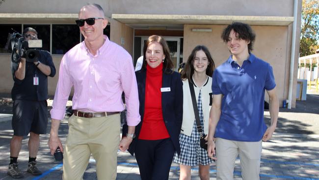 Cressida O'Hanlon arrives to vote during the Dunstan by-election with the support of family, including husband James, Phoebe, 11, and Cy, 16 on March 23, 2024. Picture: Dean Martin