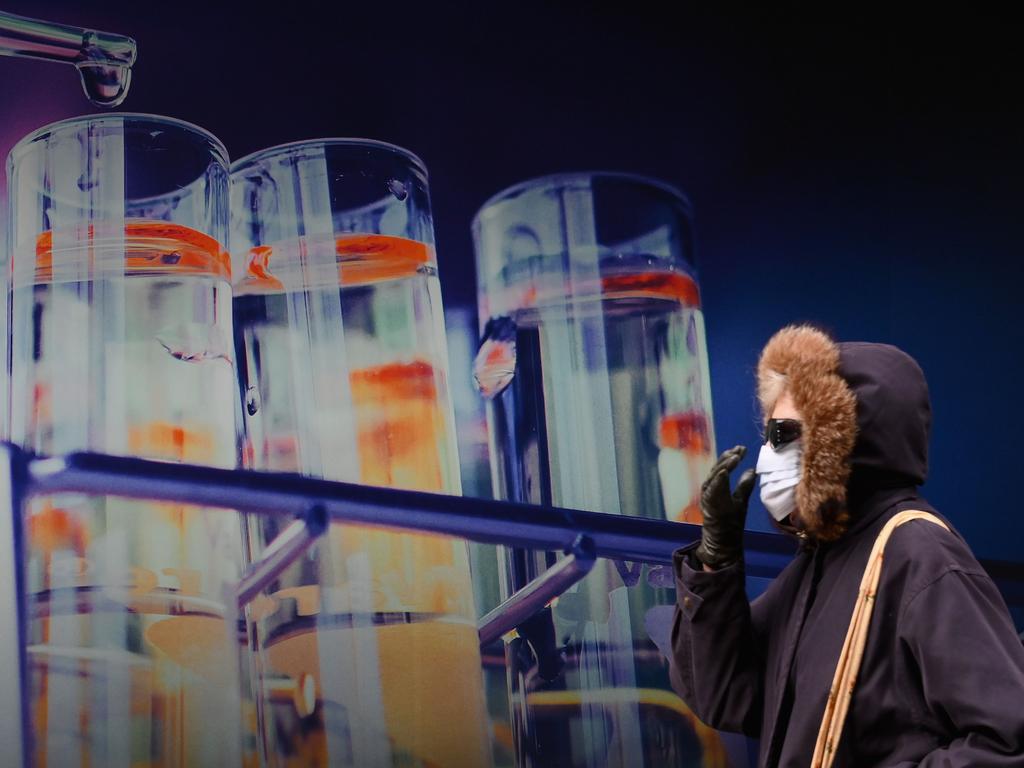 A woman walks past Pfizer headquarters in New York. Picture: AFP