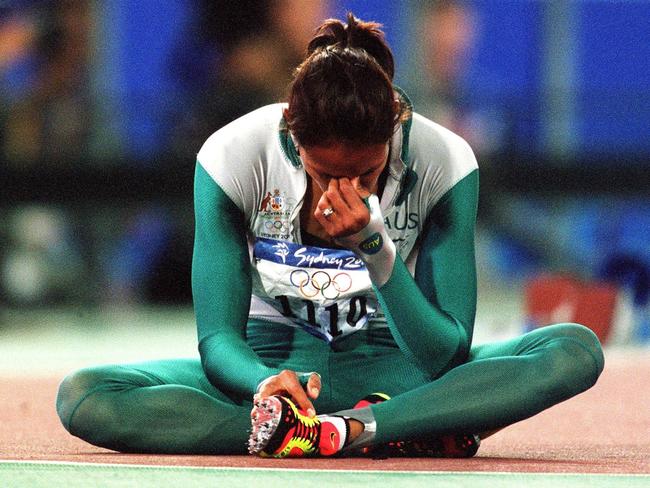 Cathy Freeman created one of the iconic moments at the Sydney Olympics. Picture: Getty