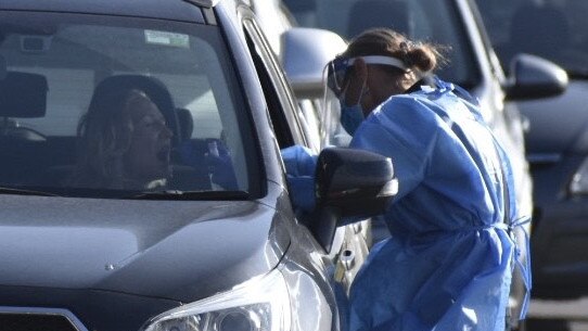 A woman is tested for Covid-19 at a drive-through clinic in Byron Bay.