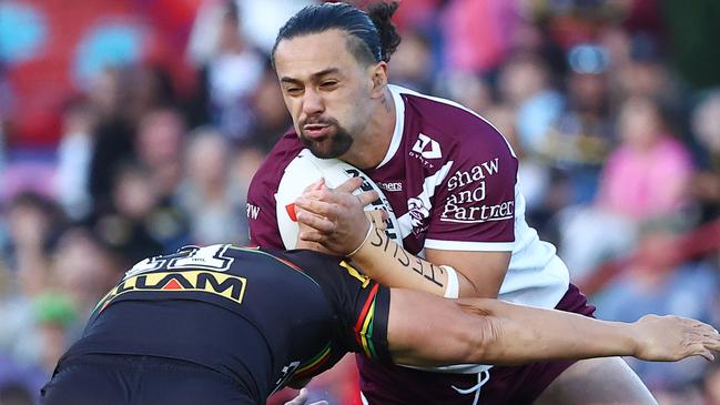 PENRITH, AUSTRALIA - JUNE 09: Josh Aloiai of the Sea Eagles is tackled during the round 14 NRL match between Penrith Panthers and Manly Sea Eagles at BlueBet Stadium, on June 09, 2024, in Penrith, Australia. (Photo by Jeremy Ng/Getty Images)