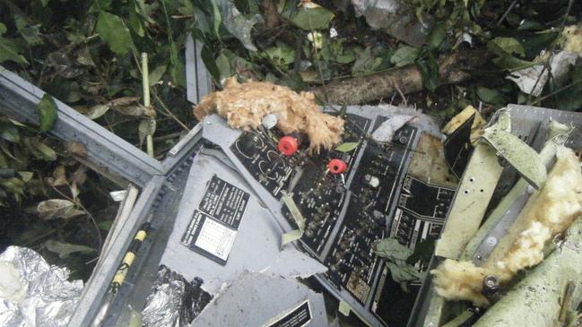 A photo released on June 28, 2010 by the French army shows debris of the plane that crashed killing Australian Ken Talbot and all onboard in thick jungle some 30 kilometres (19 miles) from Yangadou on June 19. Six Australians, two Britons, two French and one US national were on the twin turboprop plane chartered by the Perth-based Sundance Resources company, headed by colourful mining tycoon Ken Talbot, who was among the victims. AFP PHOTO/FRENCH ARMY