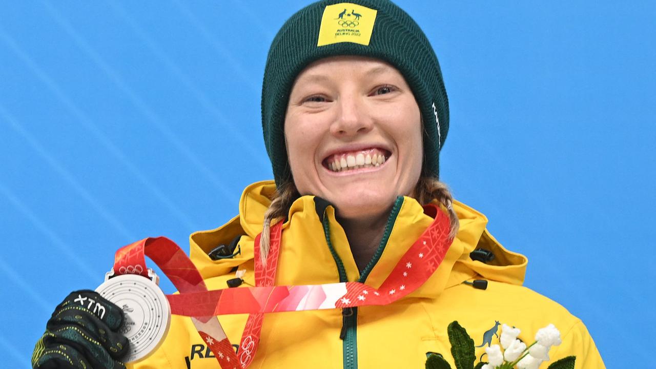 Australia's Jaclyn Narracott celebrates on the podium with her silver medal after the women's skeleton final at the Yanqing National Sliding Centre during the Beijing 2022 Winter Olympic Games on February 12. Picture: AFP
