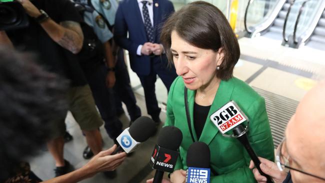 Gladys Berejiklian surrounded by media as she arrives for the ICAC hearings. Picture: NCA NewsWire / Damian Shaw