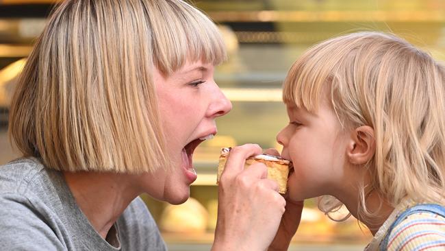 Katie Brown and Elfy, 2, enjoy a vanilla slice at Banana Boogie. Picture: Keryn Stevens