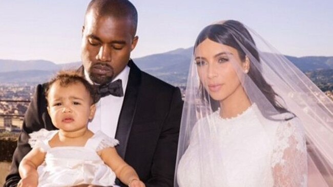 Star-studded nuptials ... Kim Kardashian, husband Kanye West with their daughter North on their wedding day. Picture: Supplied