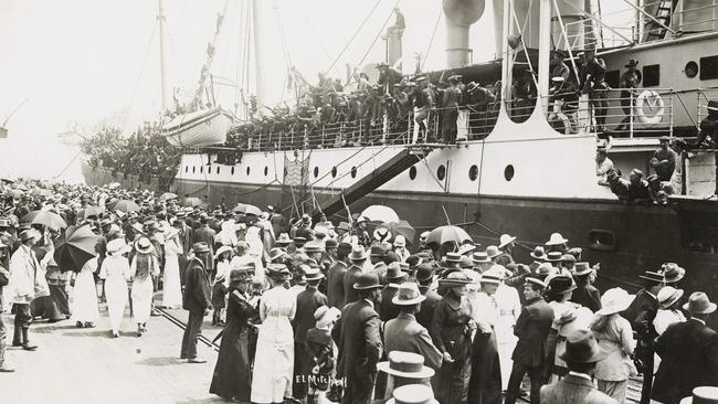 A crowd of civilians on Fremantle wharf farewel a troop transport with Australian service personnel departing for overseas duty. Picture: Australian War Memorial