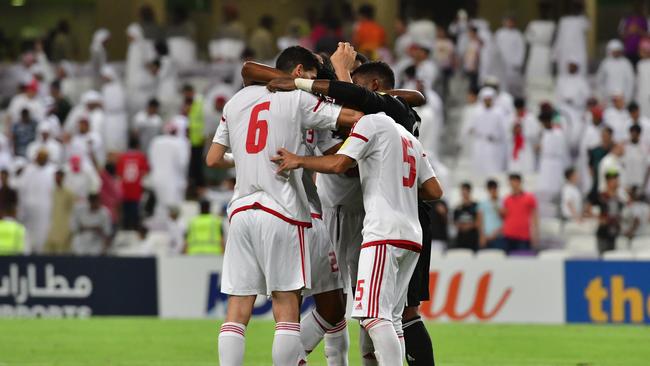 UAE players celebrate.