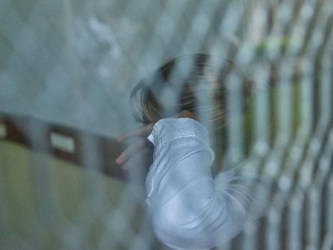 Ms Nikolic sits in a holding cell ahead of her court hearing. Picture: Mark Stewart