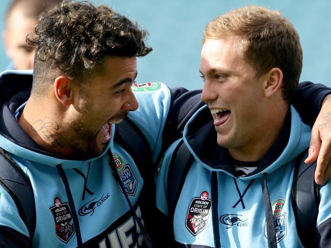 Andrew Fifita and Matt Moylan share a laugh as they arrive for the NSW Blue Origin team captains run ahead of Wednesday's game at ANZ Stadium .Picture Gregg Porteous