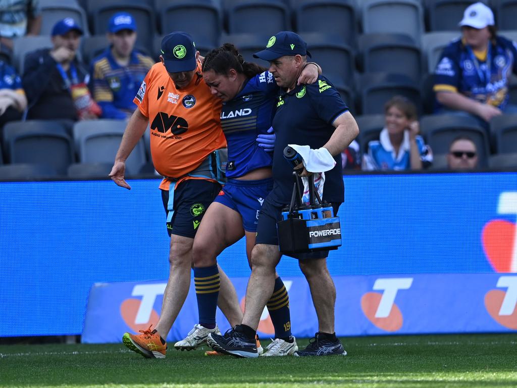 Kennedy Cherrington leaves the field after injuring her right foot. Picture: NRL Images