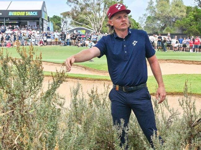 Australia's Cameron Smith looks for his golf ball in the rough during the second day of the LIV Golf Adelaide at the Grange Golf Club in Adelaide on February 15, 2025. (Photo by Brenton Edwards / AFP) / -- IMAGE RESTRICTED TO EDITORIAL USE - STRICTLY NO COMMERCIAL USE --